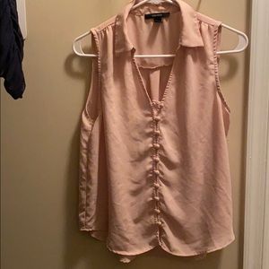 Sleeveless light pink blouse
